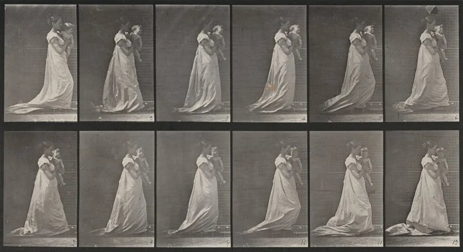 Plate Number 36. Walking and carrying a child on left arm by Eadweard Muybridge