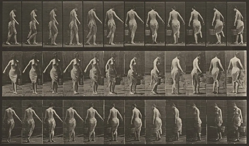 Plate Number 50. Walking and turning around, carrying a bucket of water in left hand by Eadweard Muybridge