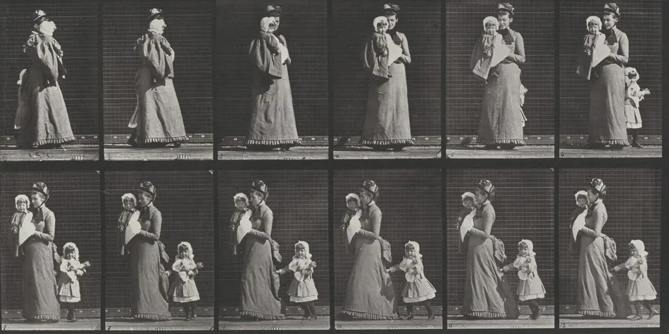 Plate Number 52. Walking, carrying a child, turning around; another child holding on to the woman's dress by Eadweard Muybridge