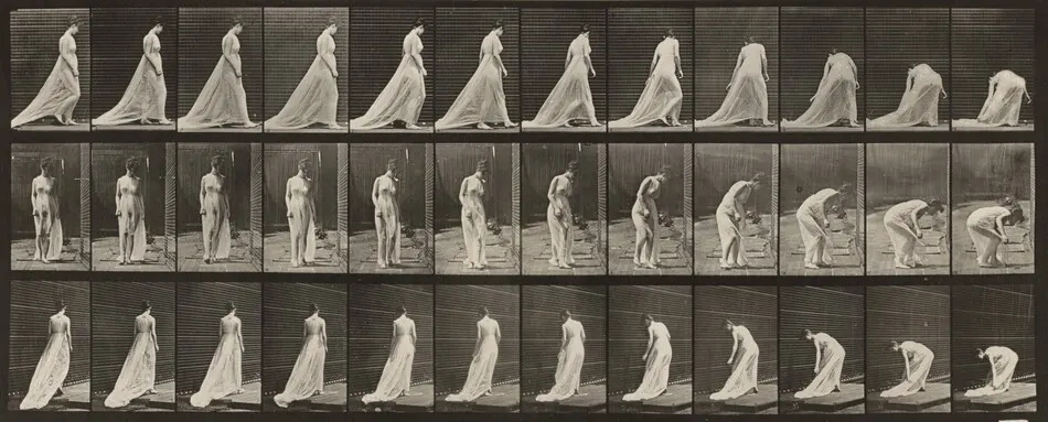 Plate Number 56. Walking, turning and stooping to lift train by Eadweard Muybridge