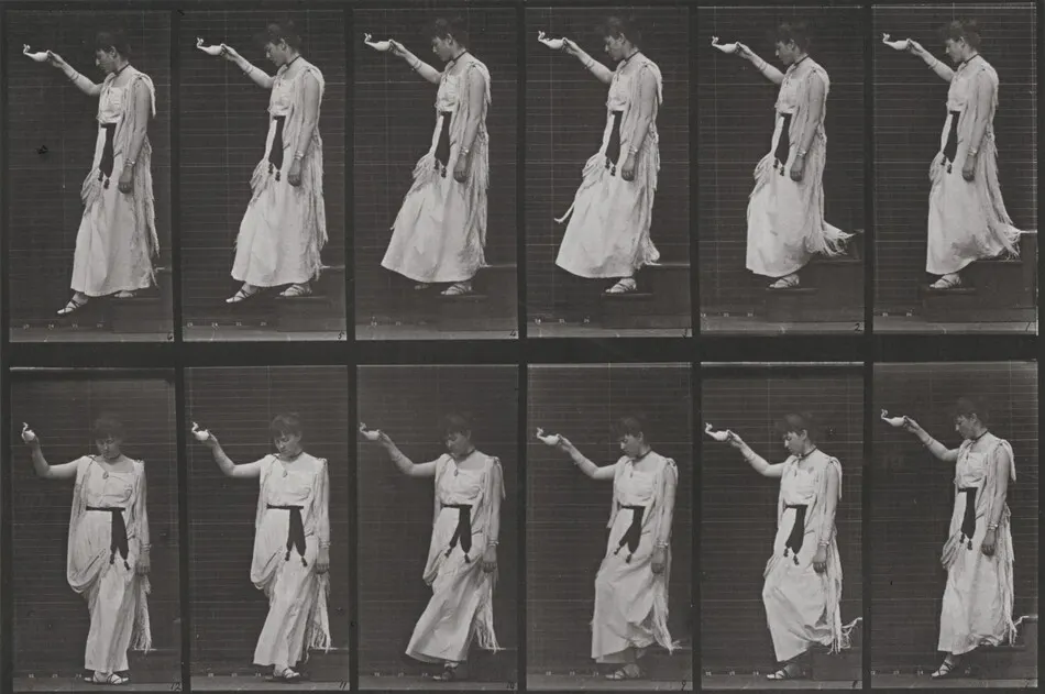 Plate Number 135. Descending stairs and turning, a lamp in right hand by Eadweard Muybridge