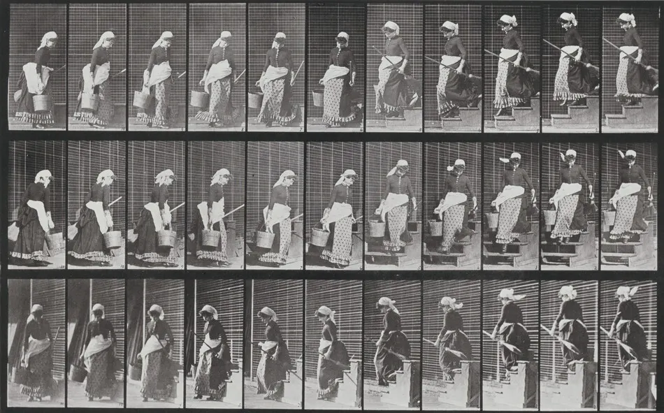 Plate Number 148. Descending stairs, turning carrying a bucket of water and a broom by Eadweard Muybridge
