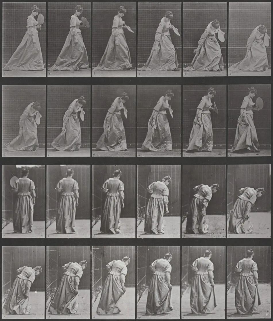 Plate Number 210. Stooping and lifting a dress, a fan in left hand by Eadweard Muybridge