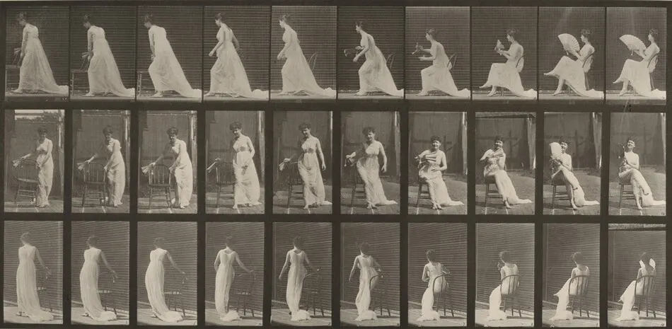 Plate Number 246. Placing chair, sitting and flirting a fan by Eadweard Muybridge