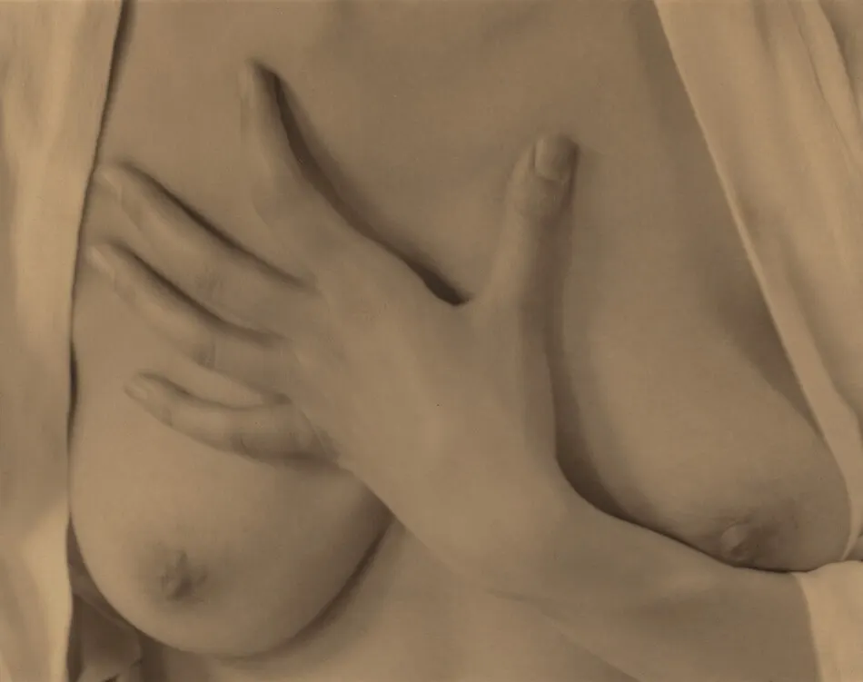 Georgia O'Keeffe—Hand and Breasts by Alfred Stieglitz