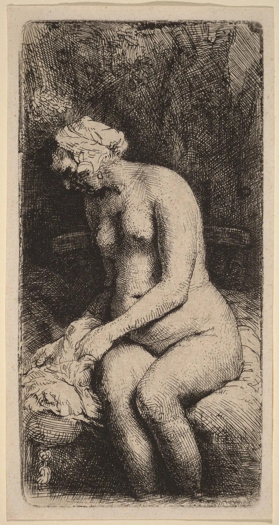Nude Seated on a Bench with a Pillow (Woman Bathing Her Feet at a Brook) by Rembrandt van Rijn